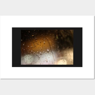 Deatil of raindrops on a car windshield at night Posters and Art